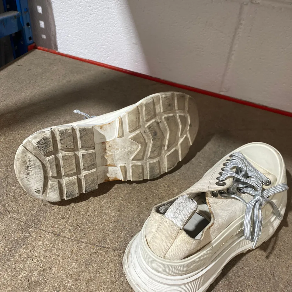 PAIR OF ALEXANDER MCQUEEN CREAM TRAINERS 