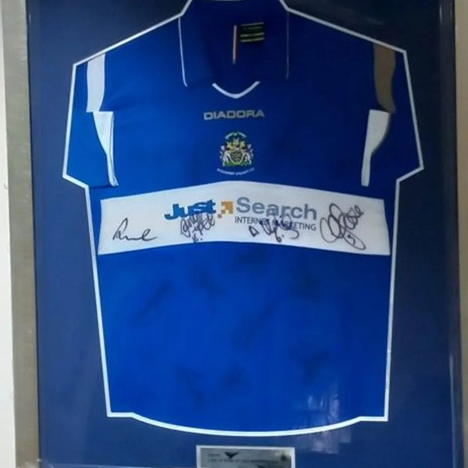 FRAMED, MOUNTED AND SIGNED STOCKPORT COUNTY FC HOME JERSEY