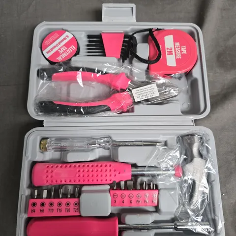 Pink-handled screwdriver set with bits in plastic case