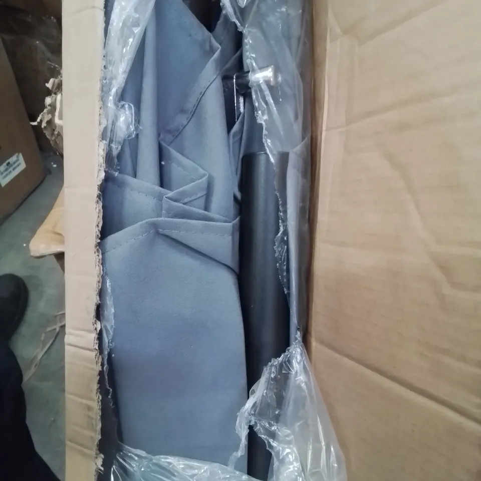 A BOXED GREY GARDEN PARASOL