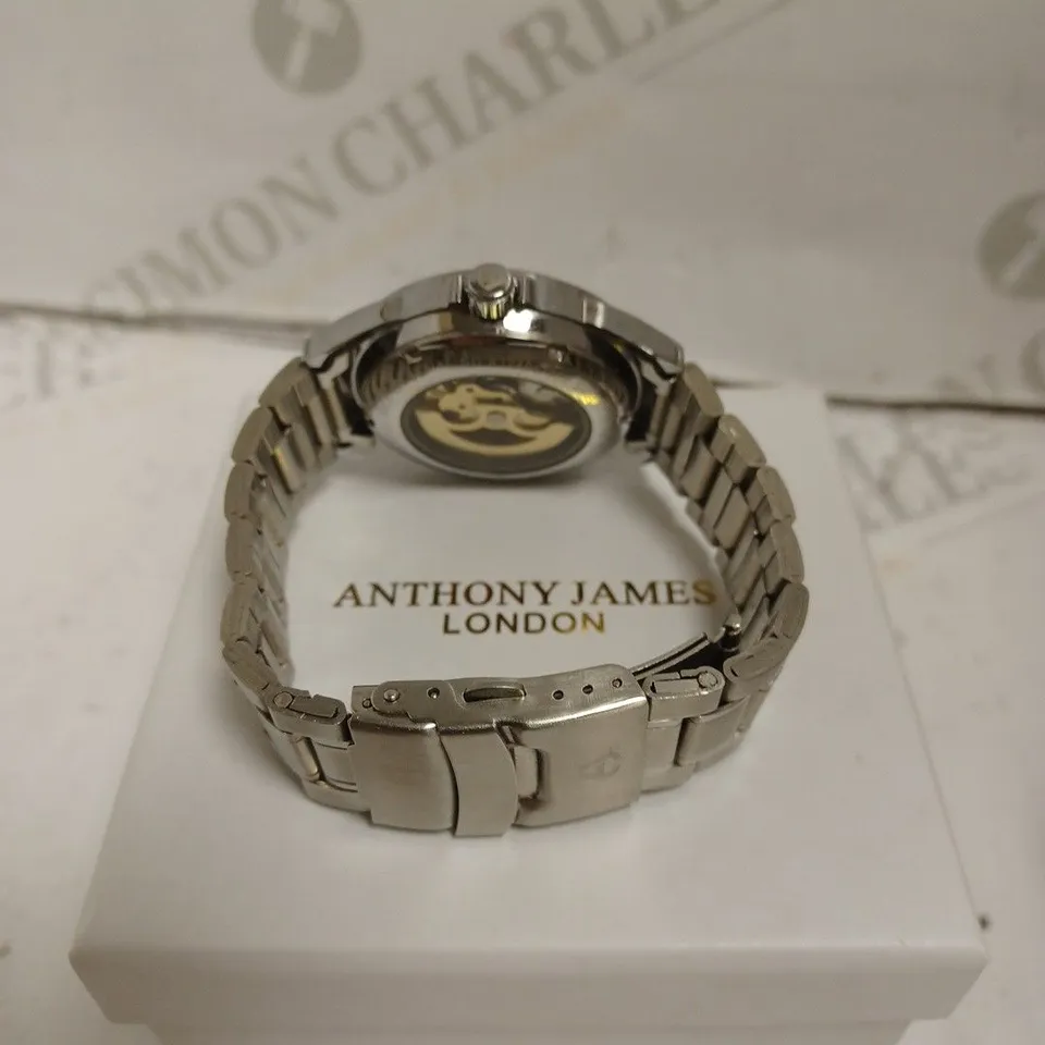 BOXED ANTHONY JAMES GENTS LIMITED EDITION SKELETON AUTOMATIC  STAINLESS STEEL WATCH - WATER RESISTANT - WITH KEY RING.