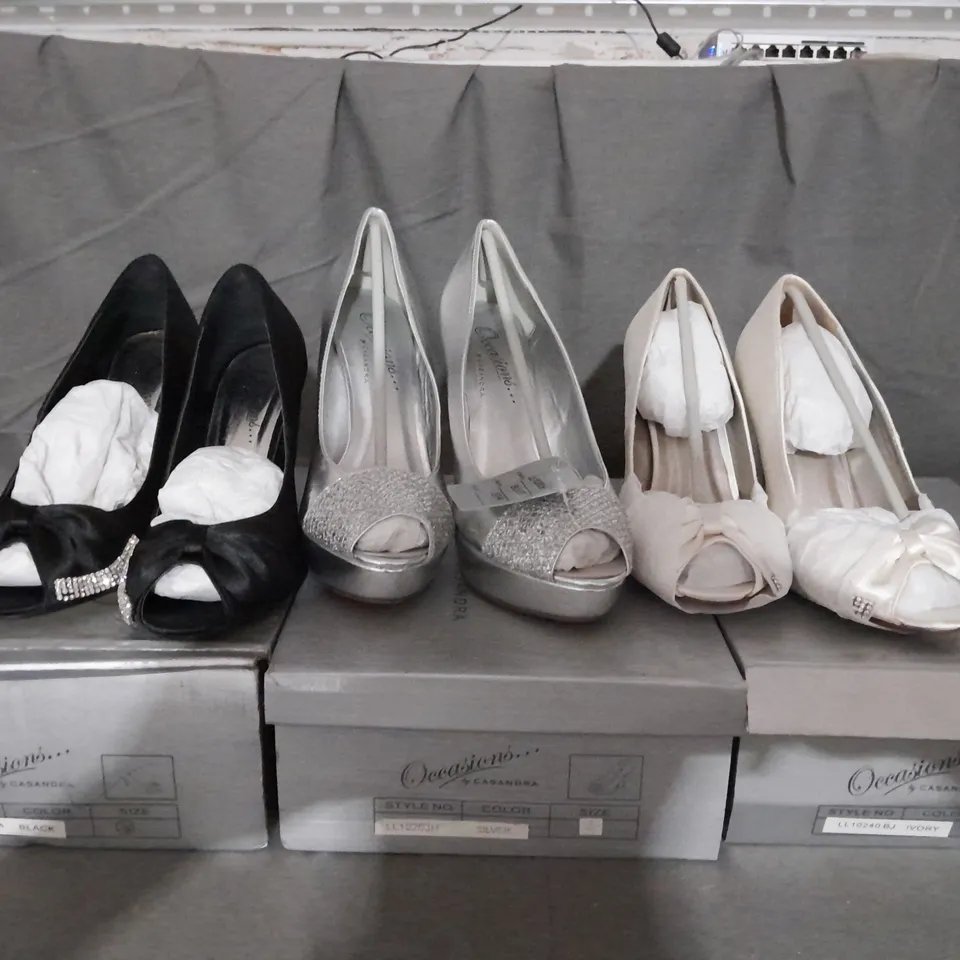 APPROXIMATELY 12 BOXED PAIR OF ASSORTED CASANDRA HEELED OPEN TOE SHOES IN VARIOUS COLOURS AND SIZES 