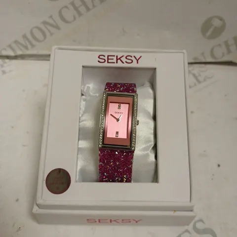 BOXED SEKSY BY SEKONDA LADIES STONE SET WATCH WITH STAINLESS STEEL BACK - JAPAN MOVEMENT.