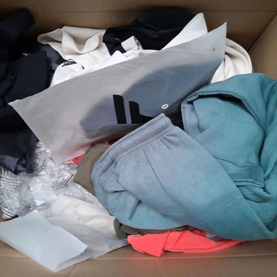 LARGE QAUNTIITY OF ASSORTED CLOTHING ITEMS IN VARIOUS SIZES AND COLORS TO INCLUDE DRESSES, T-SHIRTS AND SOCKS