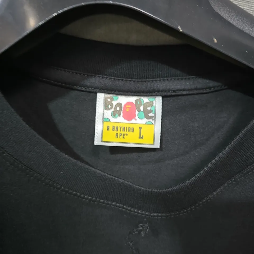 BAPE BLACK T-SHIRT WITH WHITE APE PRINT – SIZE UK L (L)