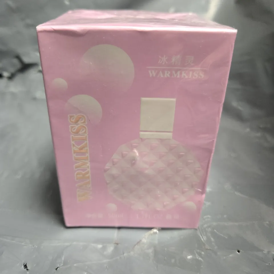 BOXED AND SEALED WARMKISS 50ML