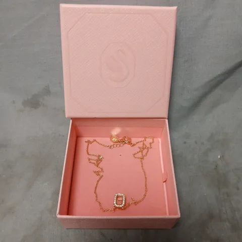 BOXED SWAROVSKI ROSE GOLD TONE NECKLACE WITH PINK STONE PENDANT
