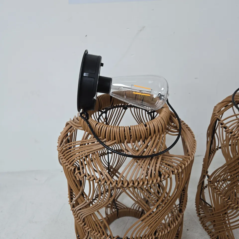 PAIR OF WOVEN RATTAN LANTERN LAMPS WITH SOLAR BULBS