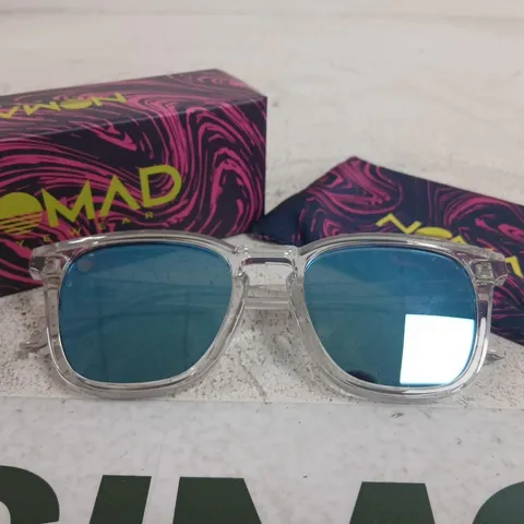 NOMAD EYEWEAR SUNGLASSES – CLEAR FRAME, BLUE LENSES