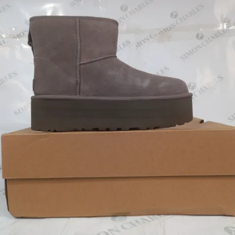 BOXED PAIR OF UGG PLATFORM SHOES IN SMOKE COLOUR UK SIZE 7