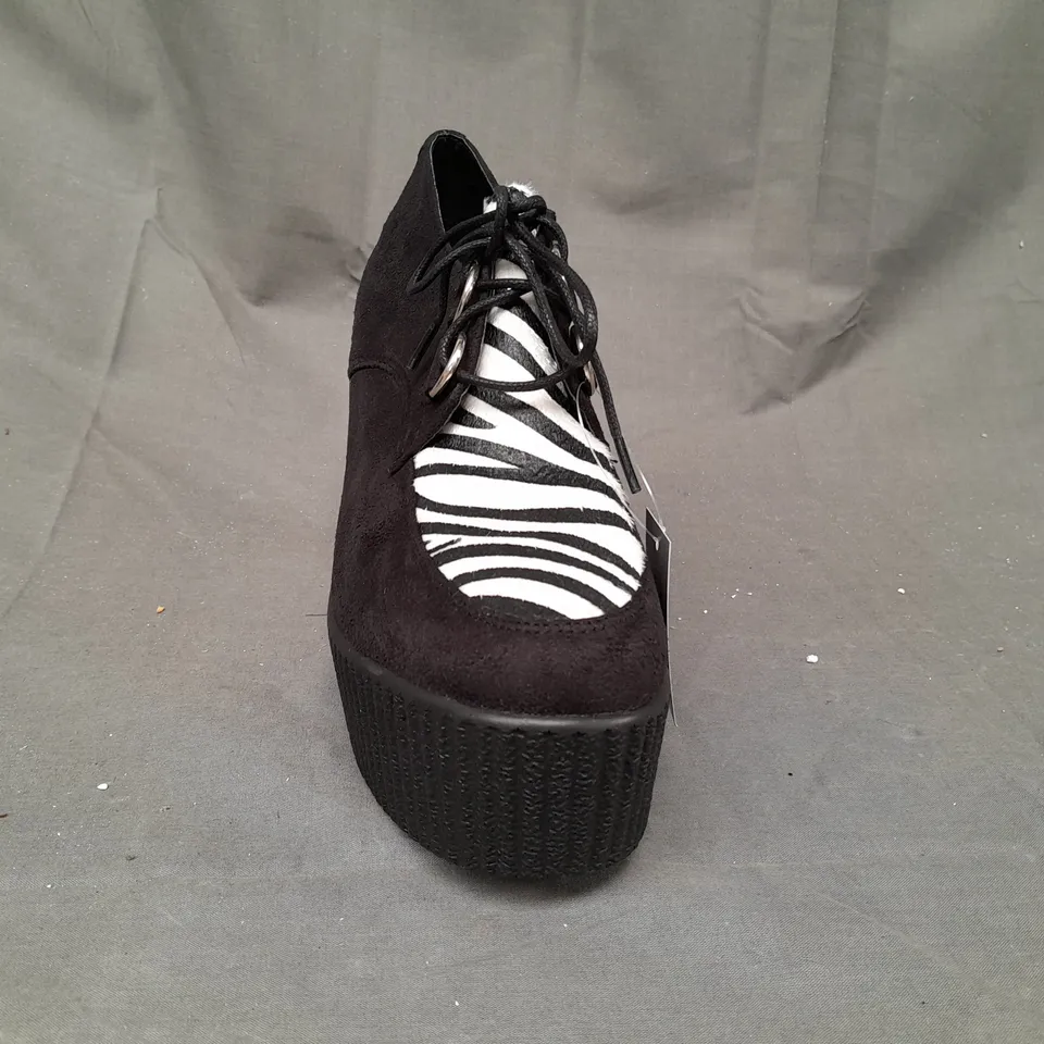 BOX OF APPROXIMATELY 10 BOXED PAIRS OF CASANDRA HIGH PLATFORM WEDGES IN BLACK/ZEBRA PRINT - VARIOUS SIZES