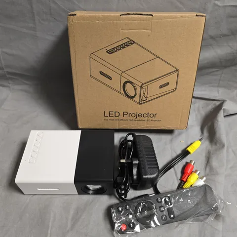 LED PROJECTOR WITH REMOTE CONTROL AND AV CABLES – BOXED