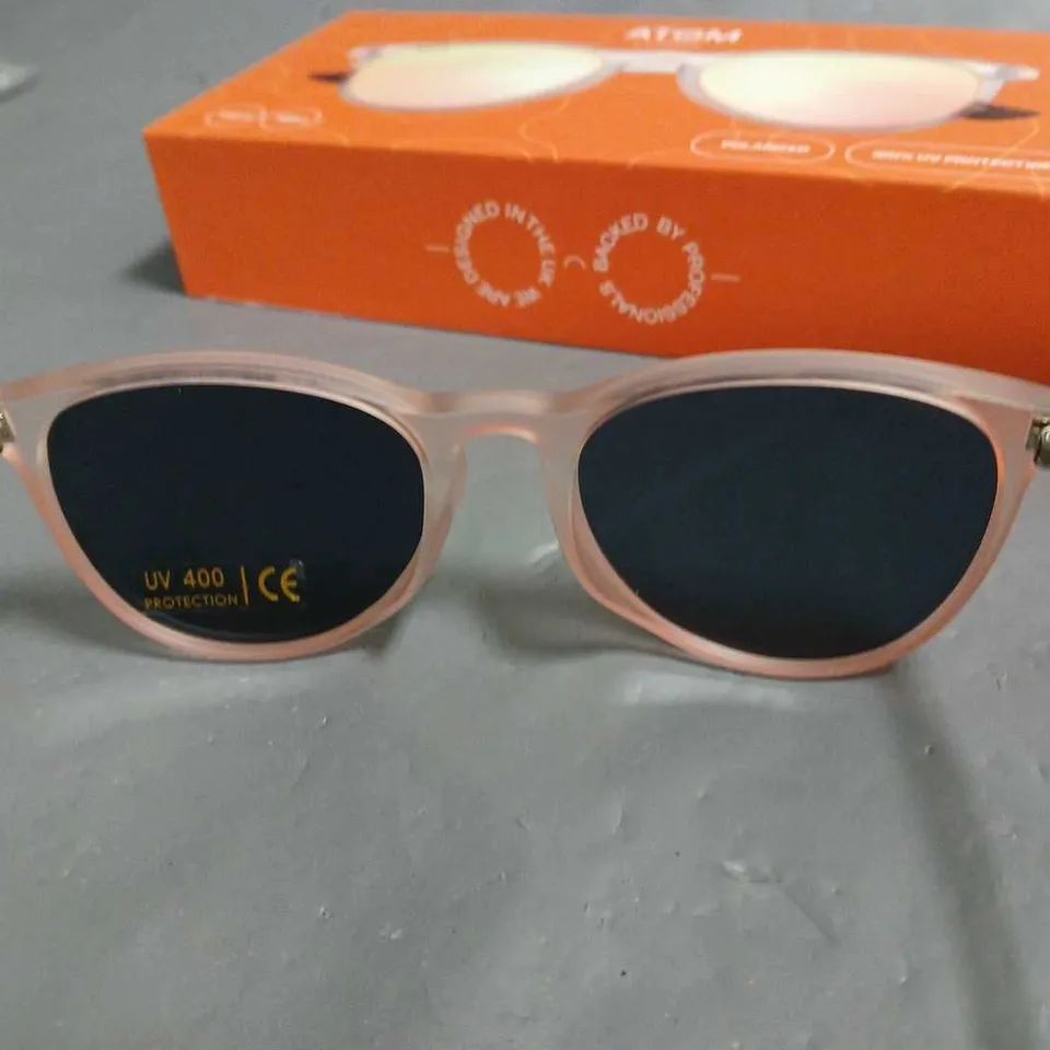 BOXED ATOM LONDON POLARISED TRANSPARENT GLASSES IN PINK