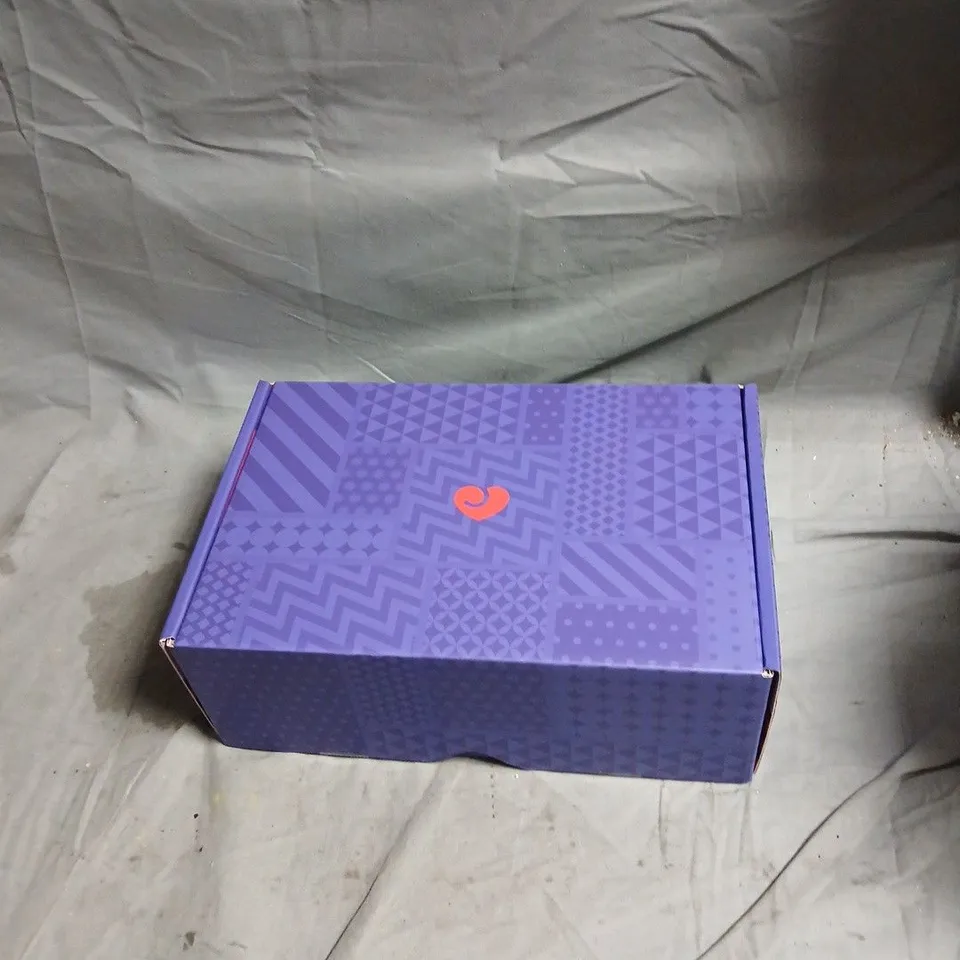 GIFT BOX OF ASSORTED SEX TOYS AND GAMES INCLUDING WATER BASED LUBRICANT , BLINDFOLD , SCENTED CANDLE