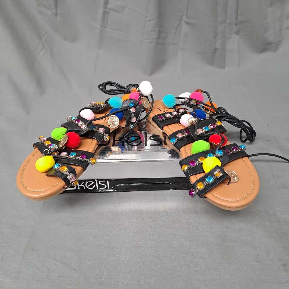 BOX OF APPROXIMATELY 12 PAIRS OF KELSHI EMBELLISHED SANDALS IN BLACK - VARIOUS SIZES 