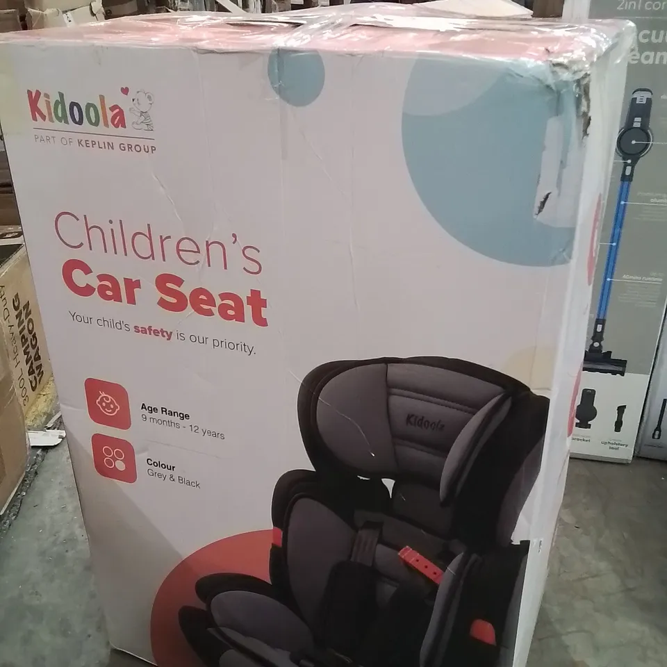 BOXED KIDOOLA CHILDREN'S CAR SEAT
