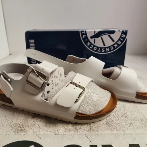 BOXED PAIR OF BIRKENSTOCK MILANO SANDALS IN WHITE SIZE UK 7