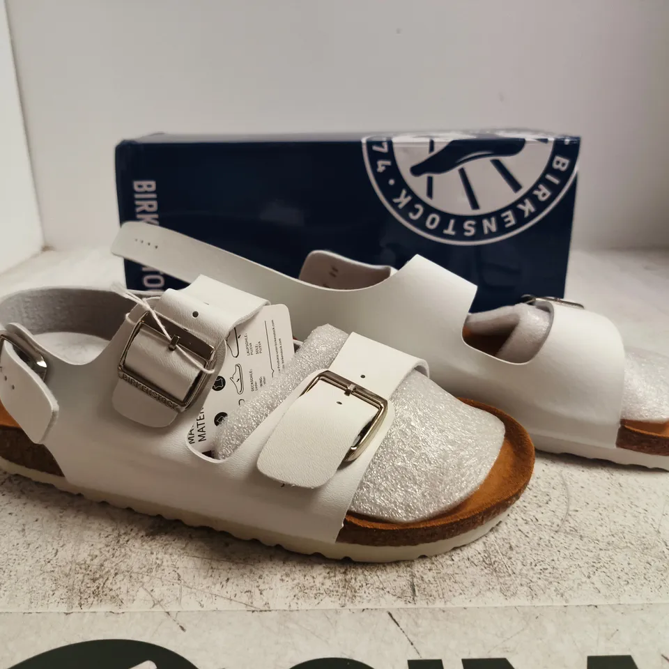 BOXED PAIR OF BIRKENSTOCK MILANO SANDALS IN WHITE SIZE UK 7