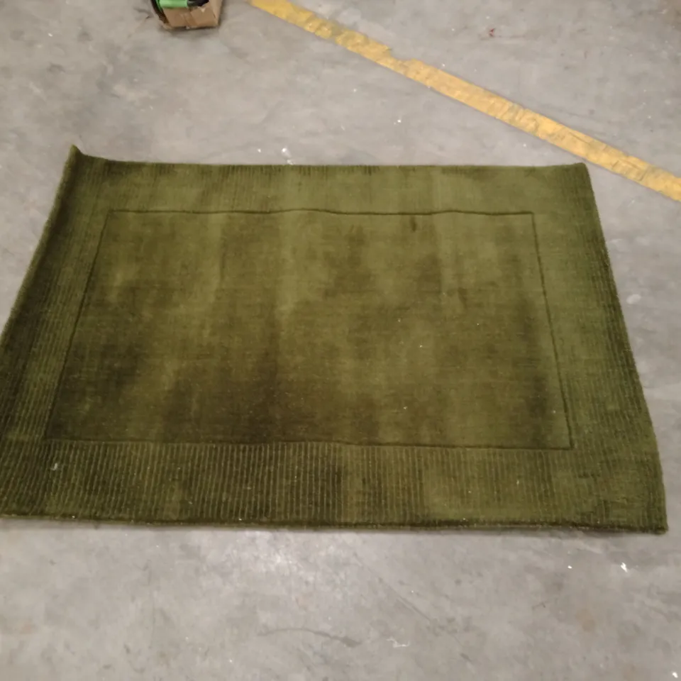 STILLAGE OF APPROXIMATELY 25 DESIGNER RUGS