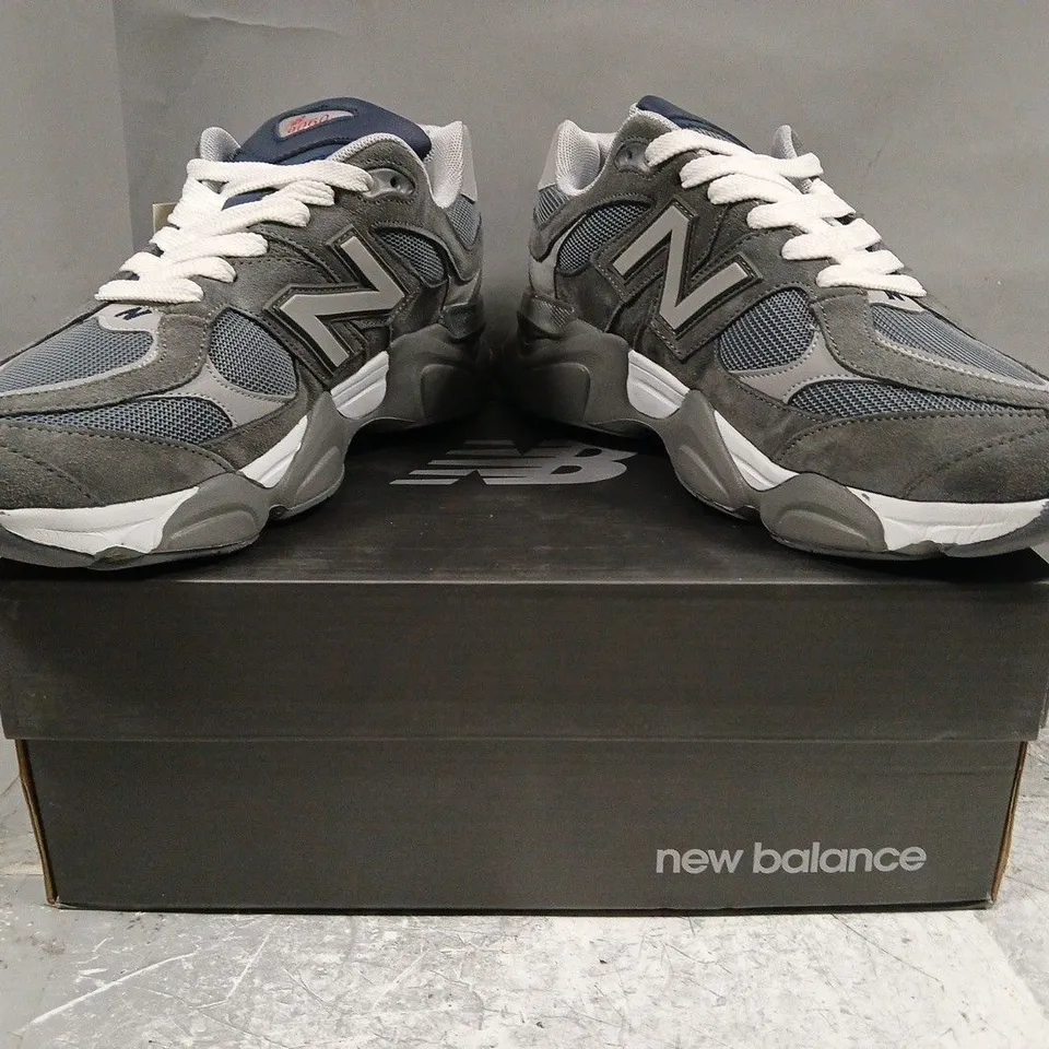 BOXED PAIR OF NEW BALANCE 9060 TRAINERS IN GREY/NAVY SIZE UK 9