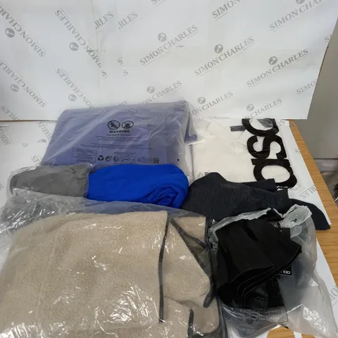 LARGE BOX OF ASSORTED CLOTHING ITEMS IN VARIOUS COLOURS AND SIZES INCLUDING TROUSERS , TOPS AND JUMPERS 