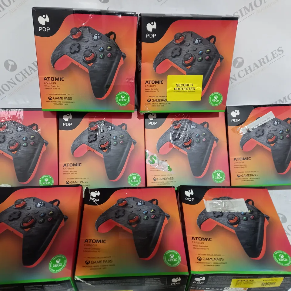 9 BOXED ATOMIC CARBON WIRED XBOX CONTROLLERS