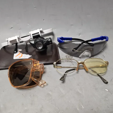 APPROXIMATELY 12 ASSORTED VISION CARE ITEMS TO INCLUDE - SUN GLASSES , SAFETY GLASSES , CARRY CASE ETC