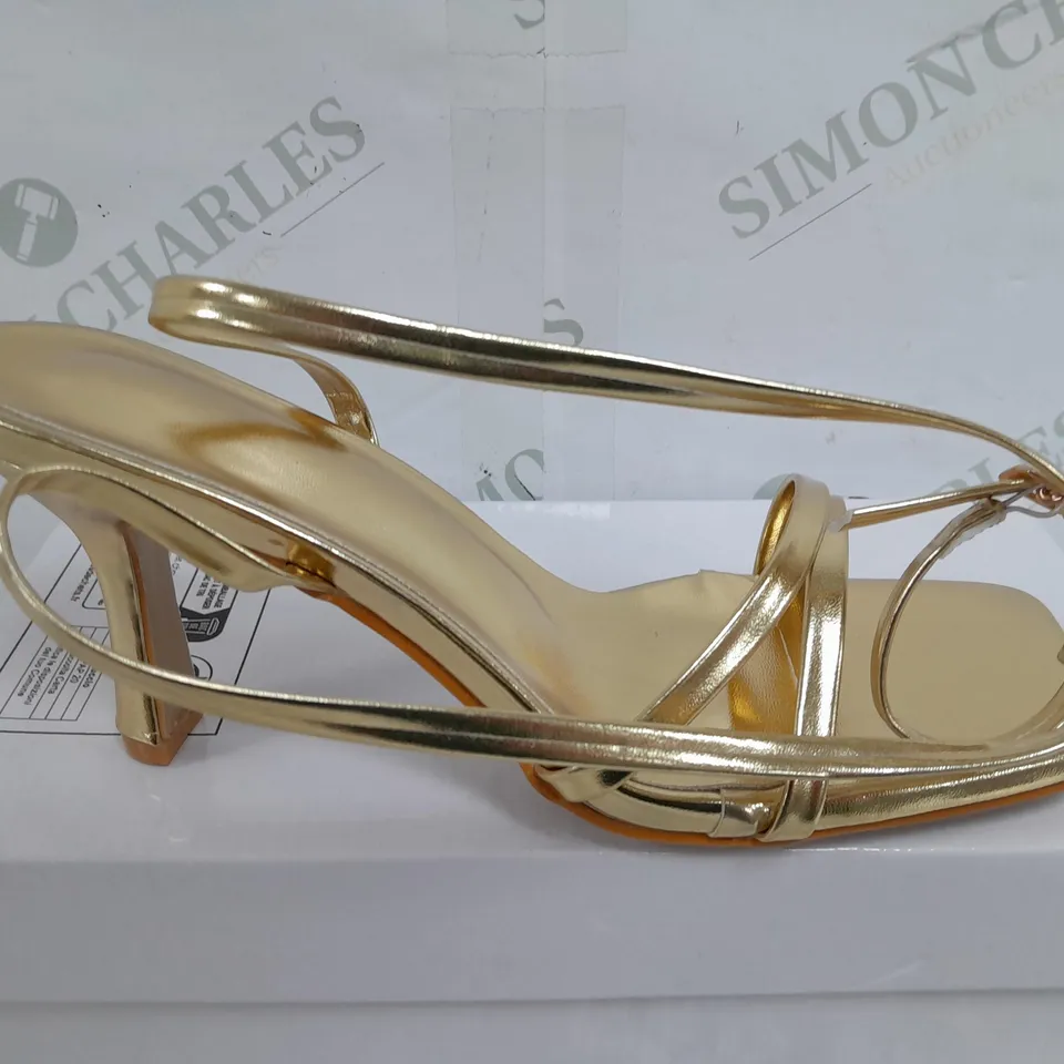 BOXED PAIR OF ASTUCCIO OPEB TOE HEELS IN GOLD - SIZE 38