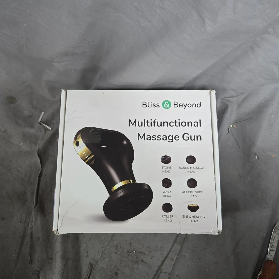 BLISS & BEYOND MULTIFUNCTIONAL MASSAGE GUN WITH SIX INTERCHANGEABLE HEADS - BOXED 