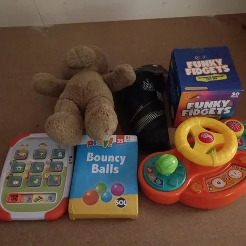 APPROXIMATELY 20 ASSORTED TOYS, GAMES, GIFTS AND NOVELTIES TO INCLUDE FUNNY FIDGETS, BOUNCY BALLS, NEWCASTLE UNITED SHIN GUARDS, ETC - COLLECTION ONLY