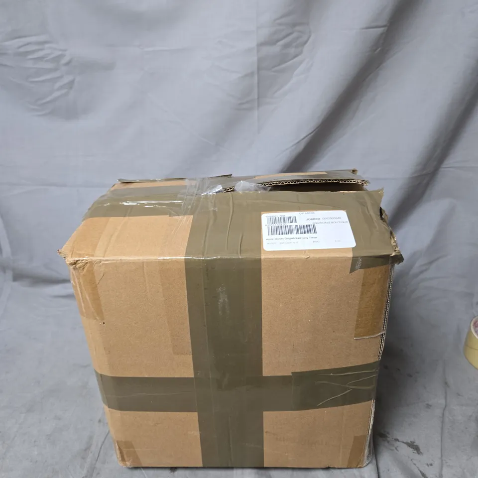 HOME STORIES GINGERBREAD COSY THROW IN CREAM .