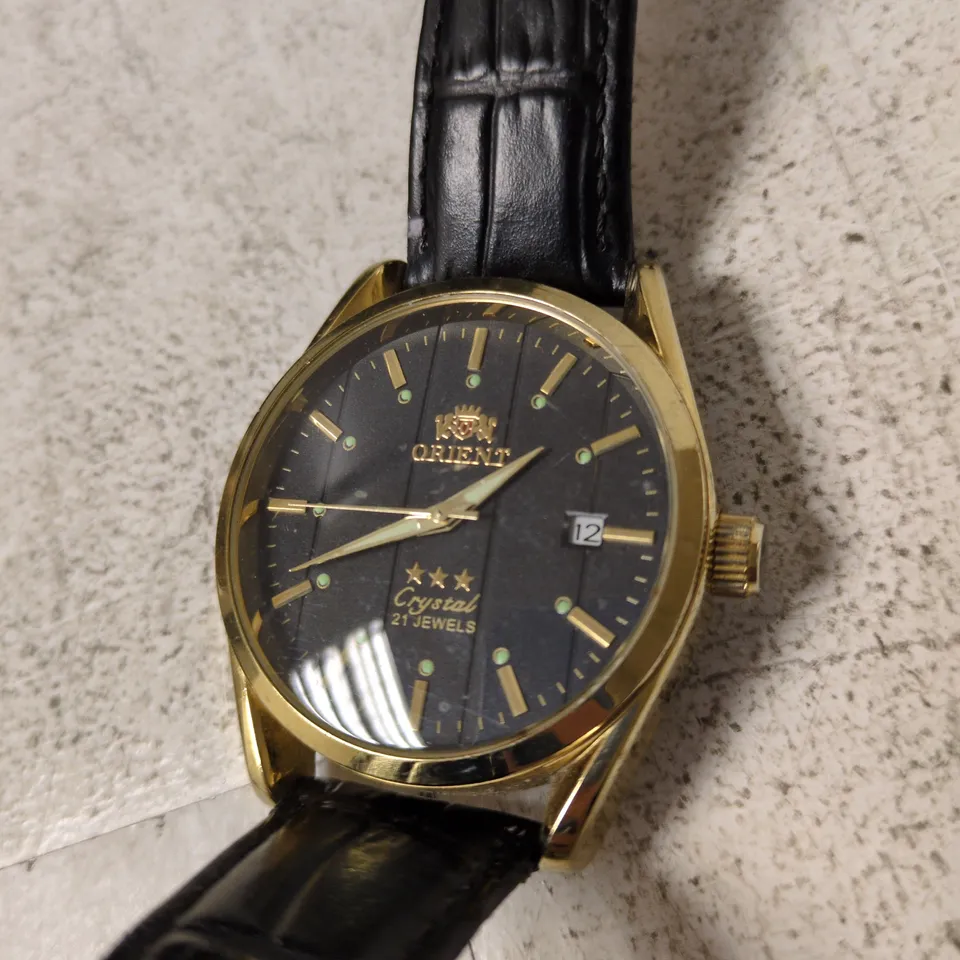 ORIENT CRYSTAL 21 JEWELS GOLD TONE WATCH WITH BLACK DIAL