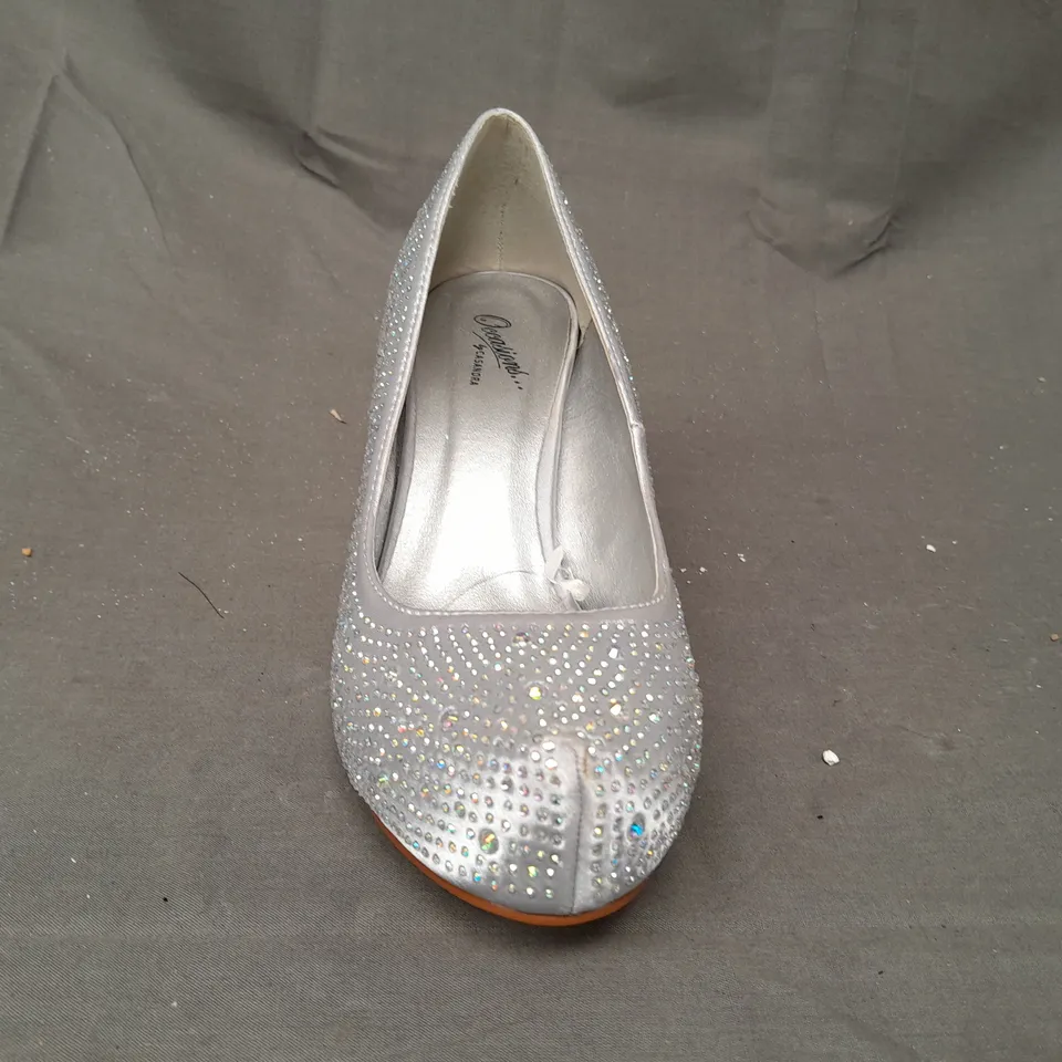 BOX OF APPROXIMATELY 10 BOXED PAIRS OF OCCASIONS BY CASANDRA CLOSED TOE MID HEEL SHOES IN SILVER SATIN W. JEWEL EFFECT - VARIOUS SIZES