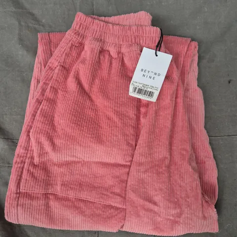BEYOND NINE HUXLEY CORD TROUSERS IN PINK SIZE MEDIUM
