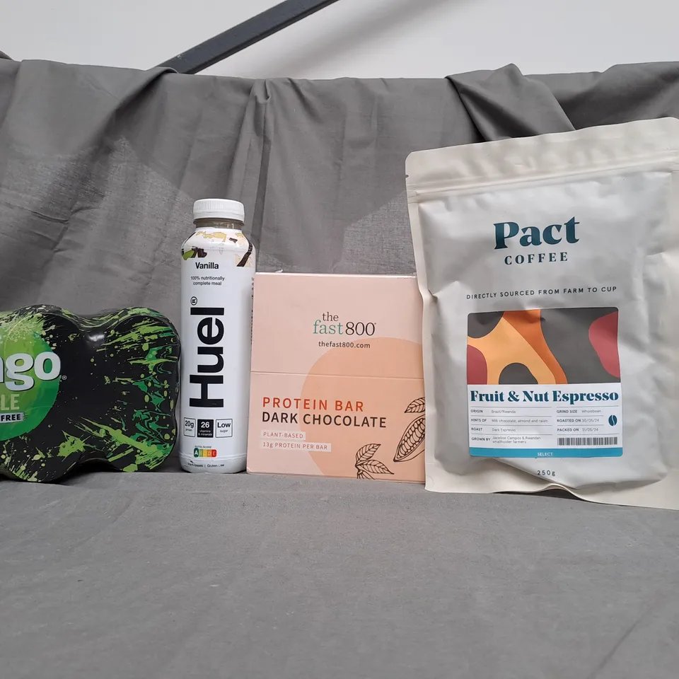 TOTE OF APPROX 8 ASSORTED FOOD ITEMS TO INCLUDE - PACT COFFEE , HUEL VANILLA , TANGO APPLE ETC