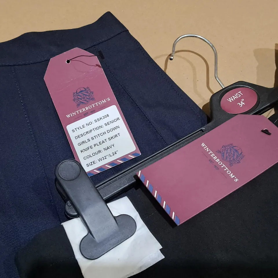 LOT OF APPROXIMATELY 100 SCHOOL SKIRTS IN VARIOUS COLOURS AND SIZES