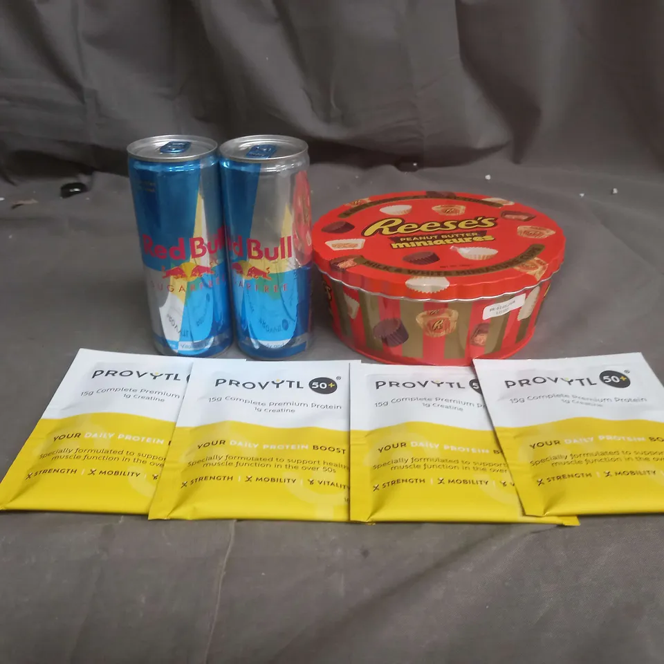 APPROX 10 ASSORTED FOOD AND DRINK ITEMS TO INCLUDE REECES, REDBULL AND PROVYTL - COLLECTION ONLY