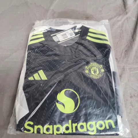 MANCHESTER UNITED GOALKEEPER JERSEY SIZE 13-14 YRS 