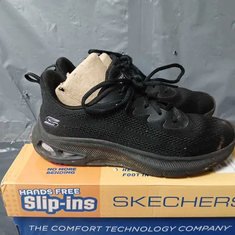 BOXED PAIR OF SKECHERS LACE UP TRAINERS IN BLACK - UK 4