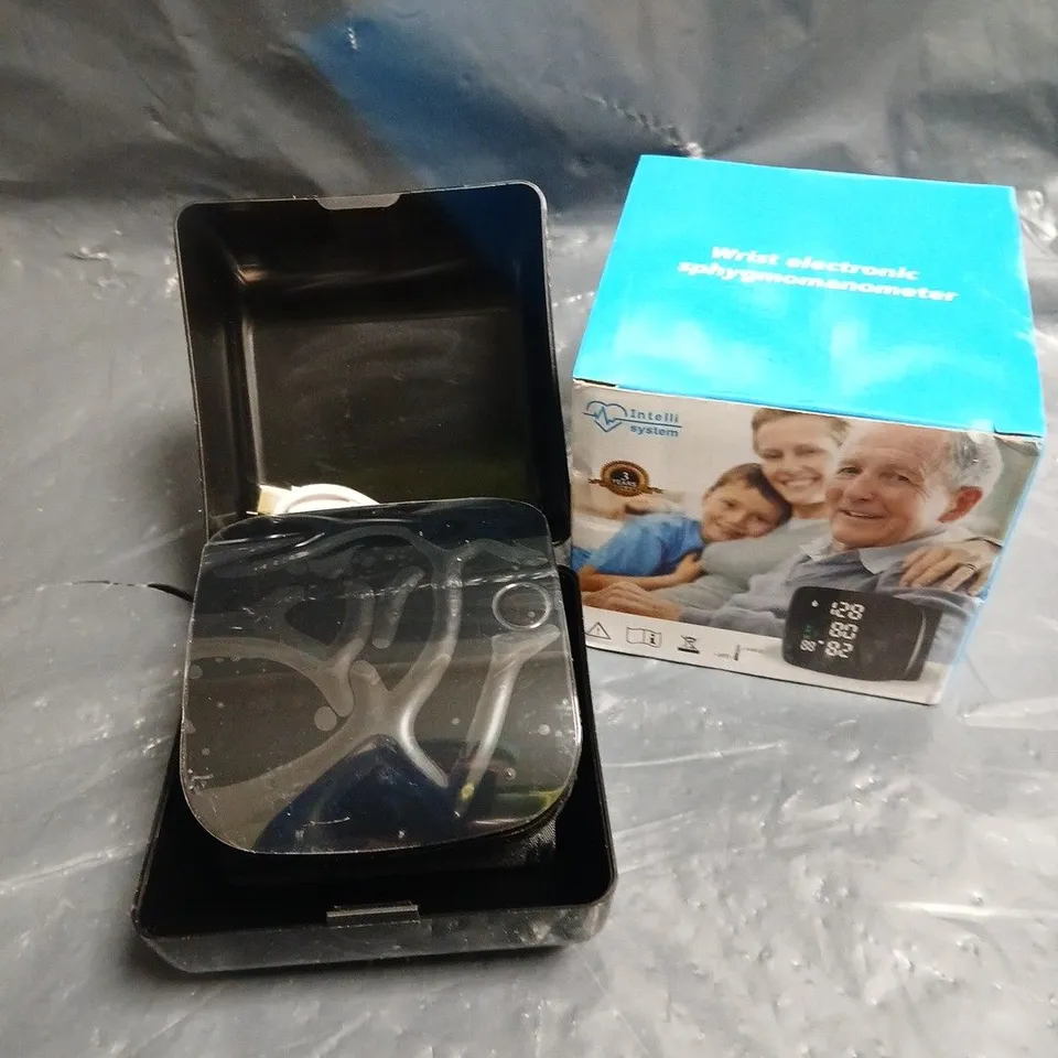 BOXED INTELLI SYSTEM ELECTRONIC PORTABLE BLOOD PRESSURE MONITOR 