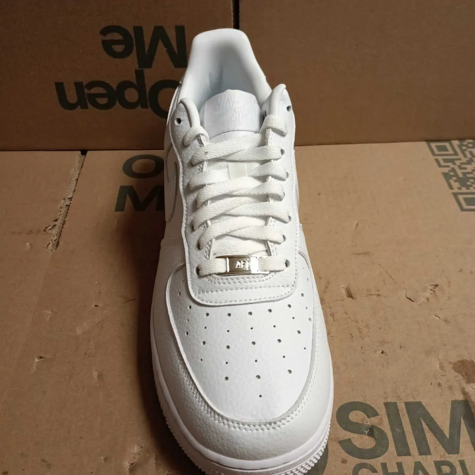 PAIR OF NIKE AIR FORCE 1 LOW WHITE LEATHER SNEAKERS – UK 9 