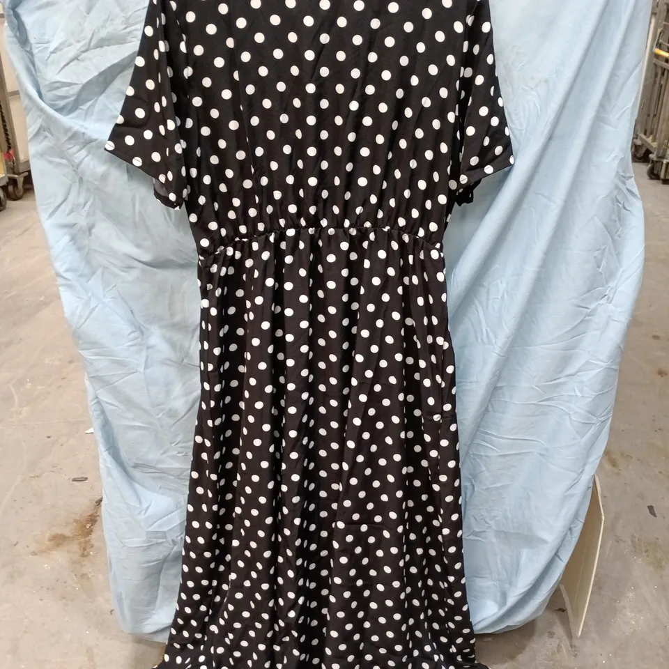 WOMEN'S BLACK & WHITE POLKA DOT MAXI DRESS WITH MATCHING BELT.