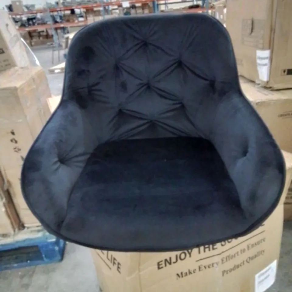 A BOXED PAIR OF BLACK VELVET UPHOLSTERED  BUTTON BACK DINING CHAIRS