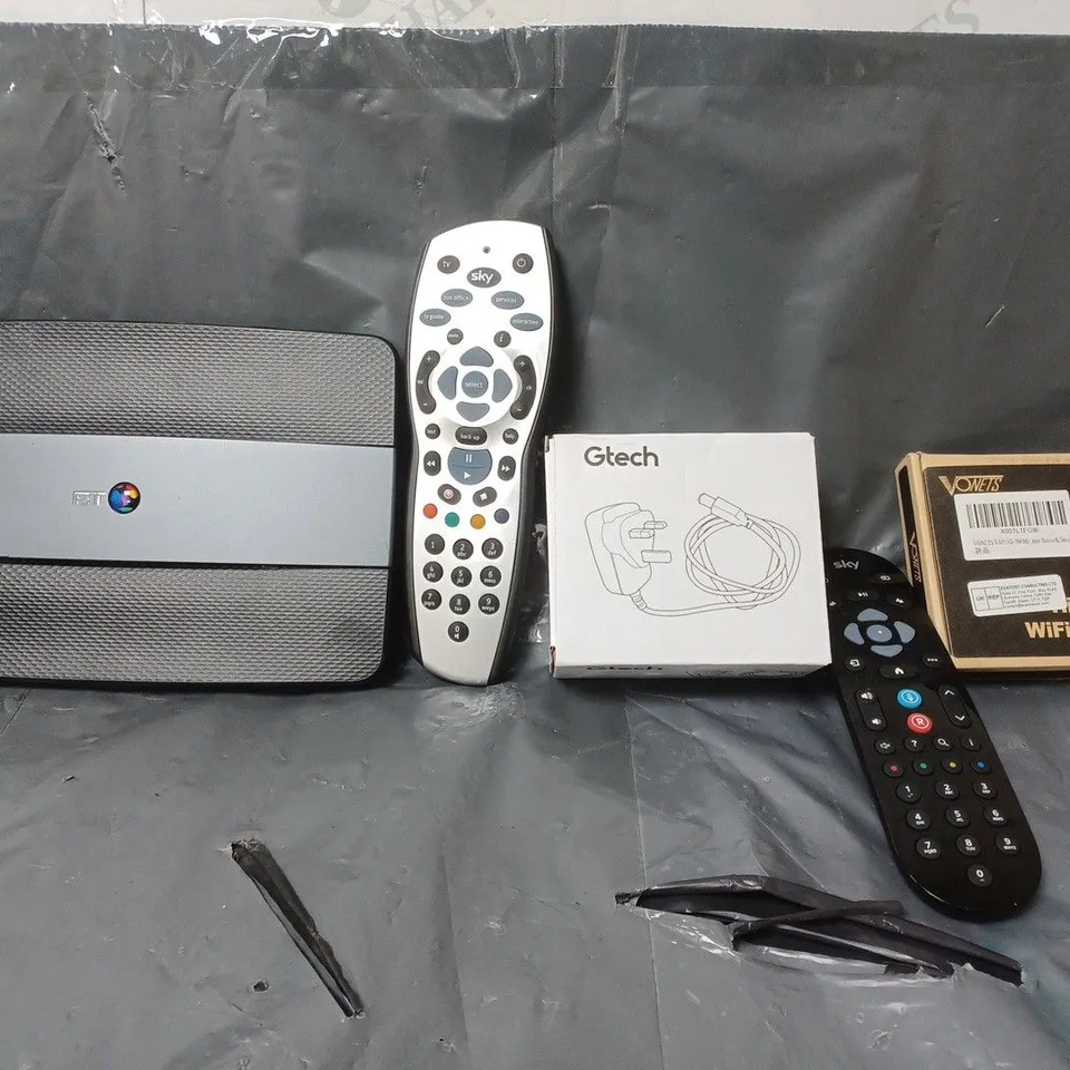 BOX OF APPROXIMATELY 12 ASSORTED ITEMS TO INCLUDE - GTECH PLUG , SKY REMOTE , BT SMART HUB ETC