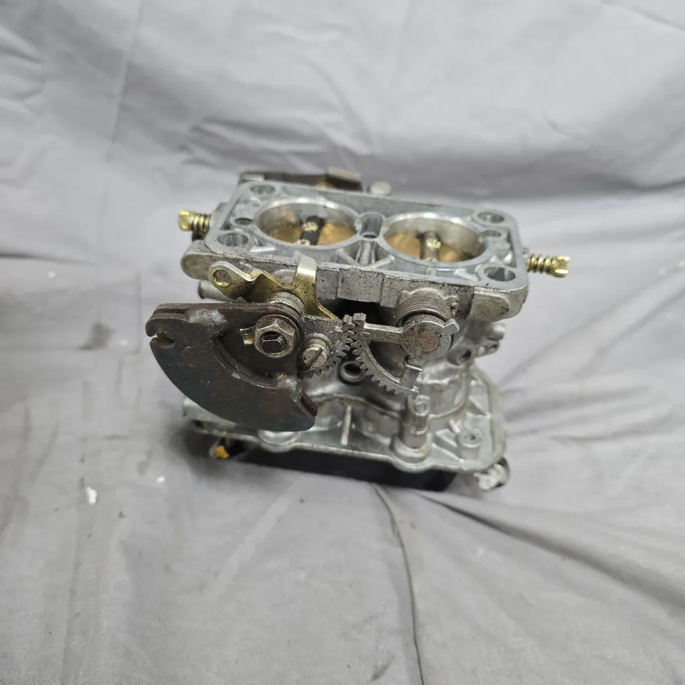 TWO-BARREL CARBURETTOR FOR PETROL ENGINE – VEHICLE PART 