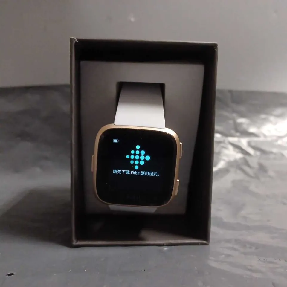 FITBIT VERSA WATCH WITH WHITE STRAP