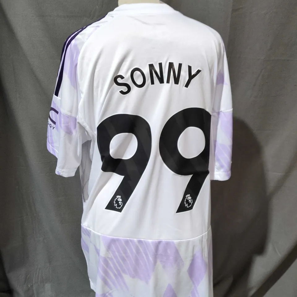 ADIDAS FOOTBALL JERSEY – SONNY 99, WHITE WITH LILAC GEOMETRIC PATTERN (SNAPDRAGON SPONSOR, PREMIER LEAGUE BADGE) SIZE XL