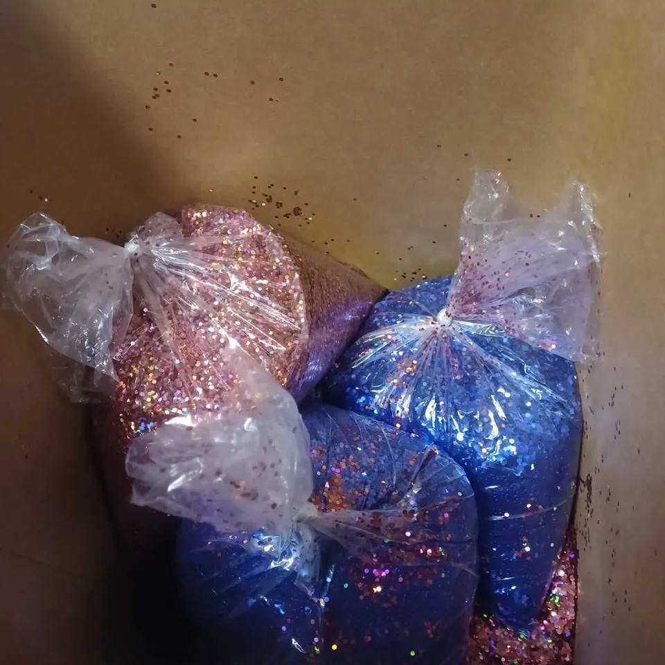 BOX OF APPROXIMATELY 8 ASSORTED GLITTER BAGS IN - PINK MULTI - PURPLE HEXAGONS - COLLECTION ONLY