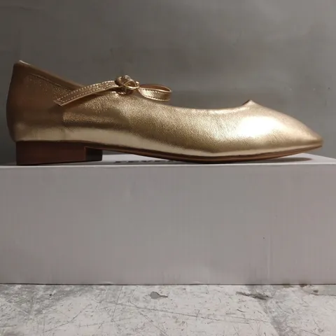 BOXED PAIR OF FEVER SOLE SHOES IN METALLIC GOLD SIZE EU 41
