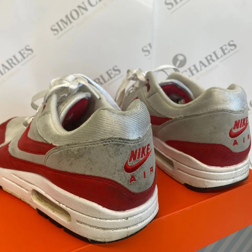 BOXED PAIR OF NIKE RED/GREY SIZE 9 TRAINERS 